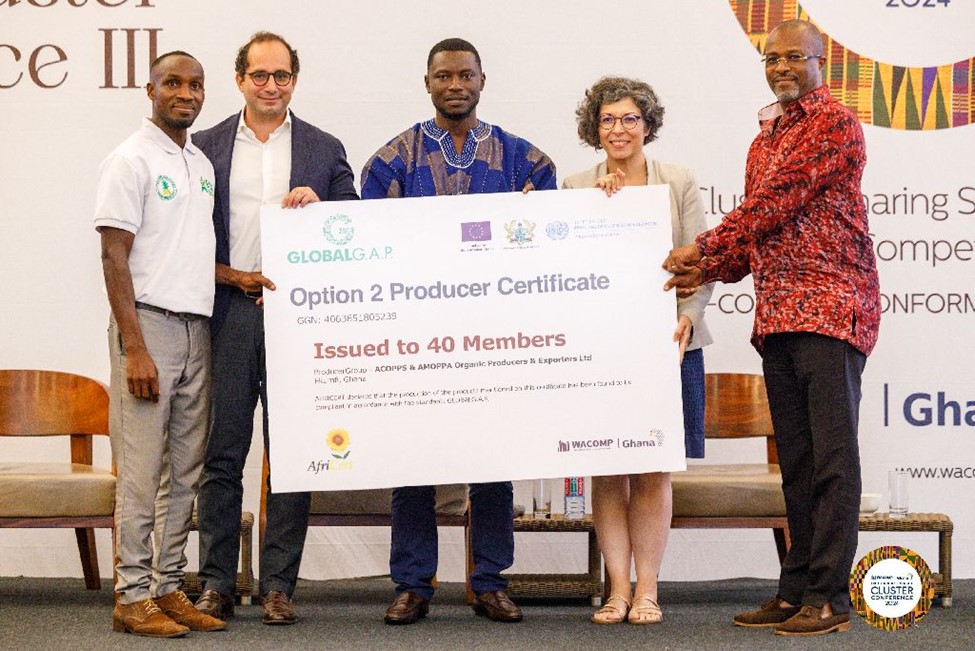 Global GAP certificate presented to ACOPPS and AMOPPA Representatives by Mr. Stavros Papastravou, UNIDO Officer in Charge to Ghana and Liberia (2nd left) and Mrs. Ebe Muschialli , WACOMP - Ghana Project Manager (2nd right)